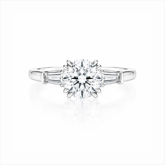 Round Lab-Grown Diamond Three-Stone Ring with Tapered Baguette Side Stones - White
