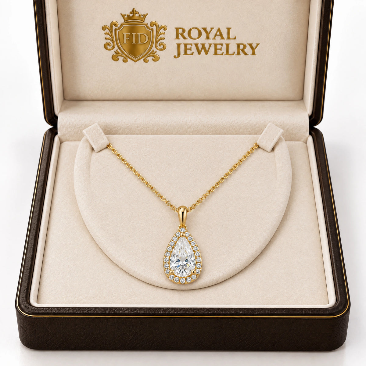 A gold teardrop pendant necklace with a clear central gemstone and a halo of small clear stones, displayed inside an open dark brown jewelry box with a cream insert. The inside lid shows the brand name 'FID ROYAL JEWELRY'.