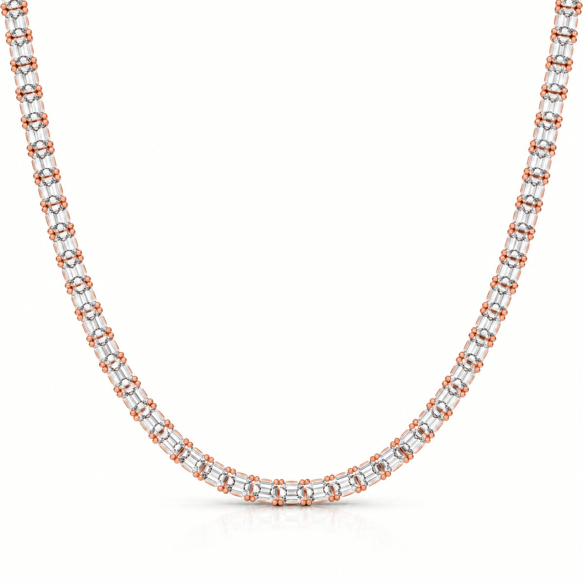 A tennis-style necklace featuring baguette-cut clear gemstones in a silver-toned setting with rose gold accents at the ends of each link, shown against a plain white background.