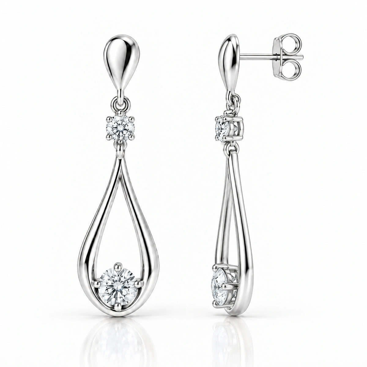 A pair of silver teardrop dangle earrings with clear gemstones, shown from both front and side angles on a white background.